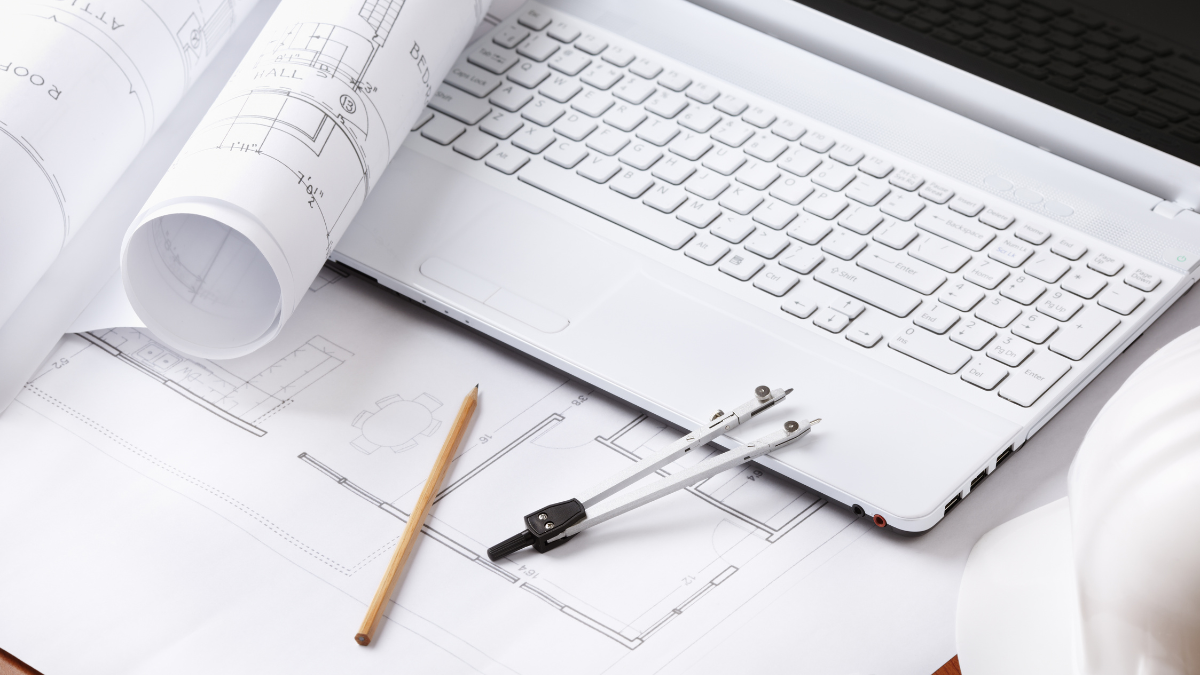 Team collaborating with laptops